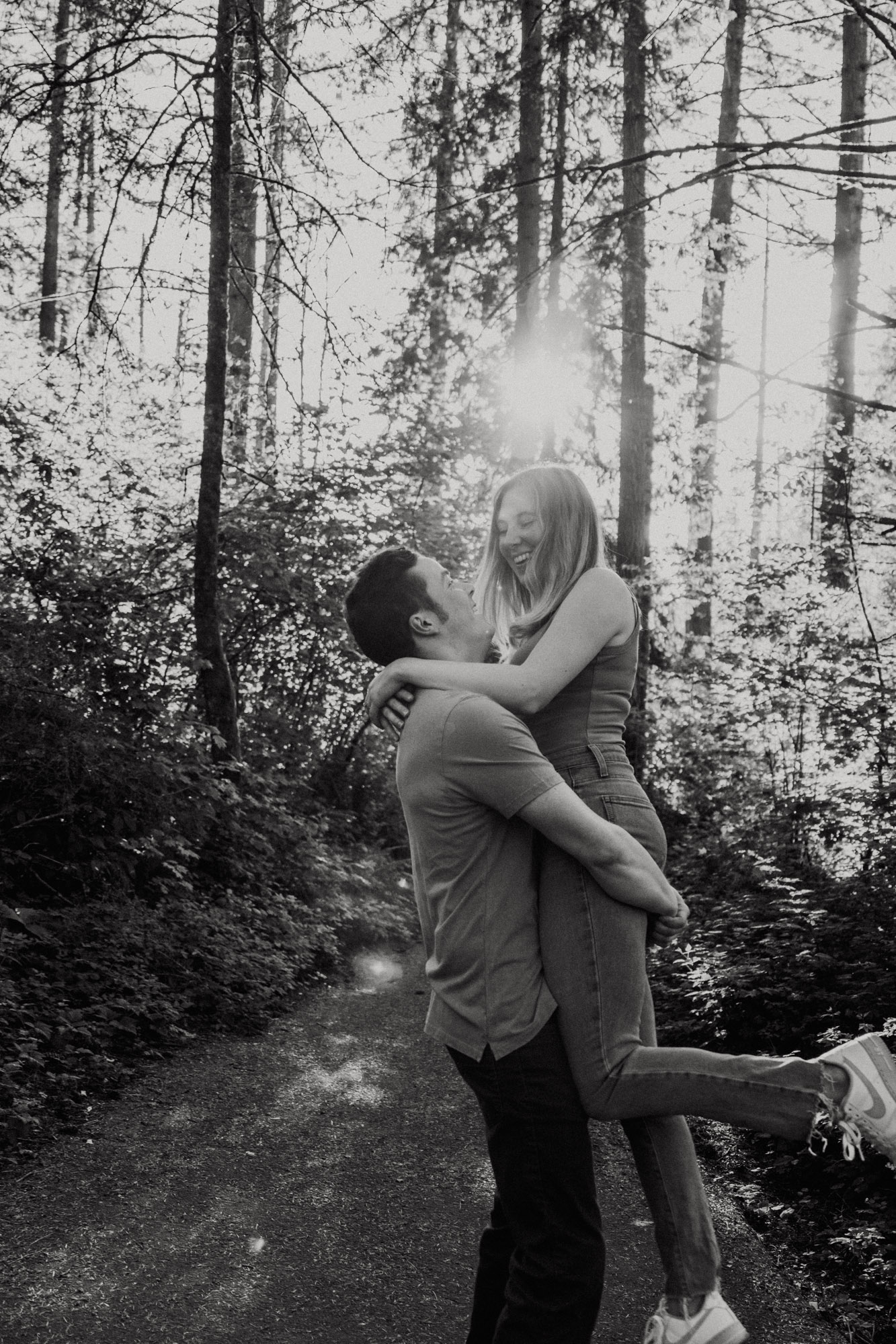 Colleen & Eric laughing and having a good time together on a paved scenic area